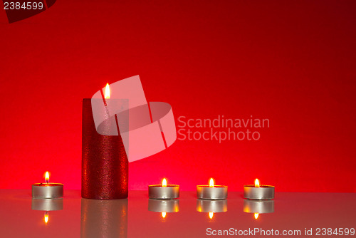 Image of Five burning candles