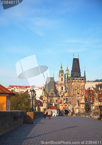 Image of Charles bridge early in the morning with tourists