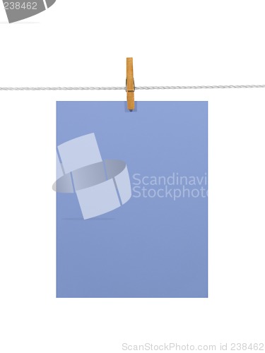 Image of Purple-blue paper sheet on a clothes line (+2 clipping paths)