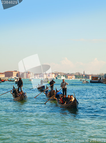 Image of Gondolas with tourists at Grand canal in Venice