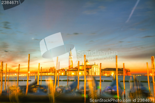 Image of Gondolas floating in the Grand Canal