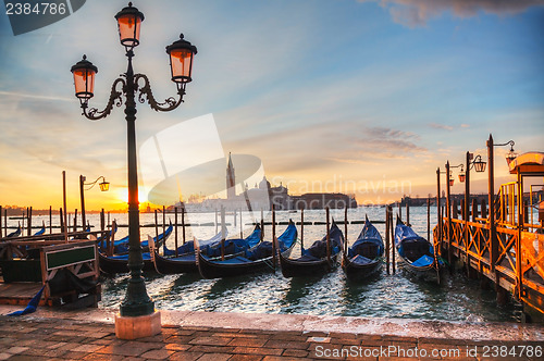 Image of Gondolas floating in the Grand Canal