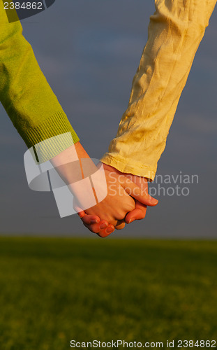 Image of Teen girls holding hands