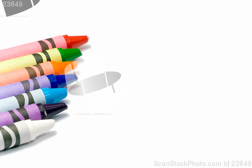 Image of Colorful crayons on a white background with text space