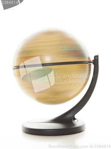 Image of Spinning globe against white background