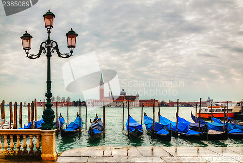 Image of Gondolas floating in the Grand Canal