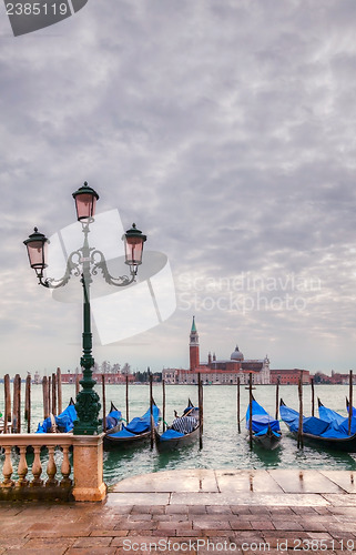 Image of Gondolas floating in the Grand Canal