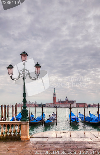 Image of Gondolas floating in the Grand Canal