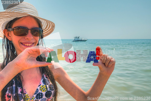 Image of Teen girl at a beach