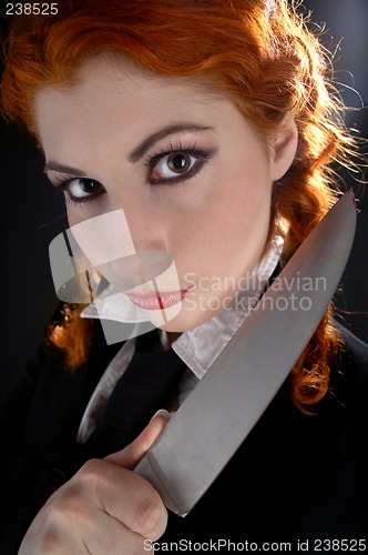 Image of crazy schoolgirl with knife #2