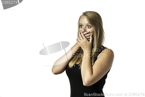 Image of Shocked young girl in black shirt