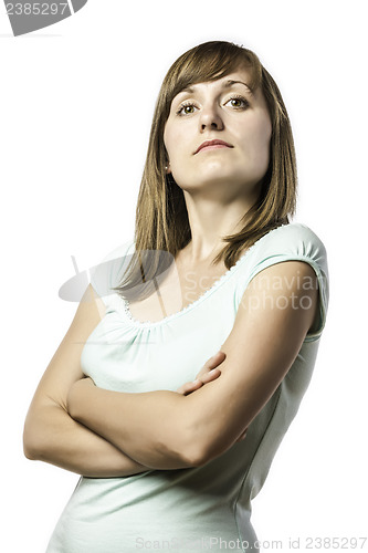 Image of Arrogant looking young standing woman