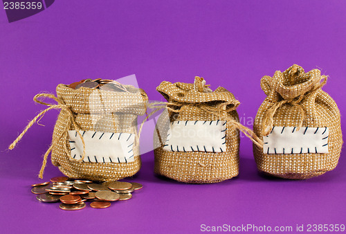 Image of Three sacks full of coins