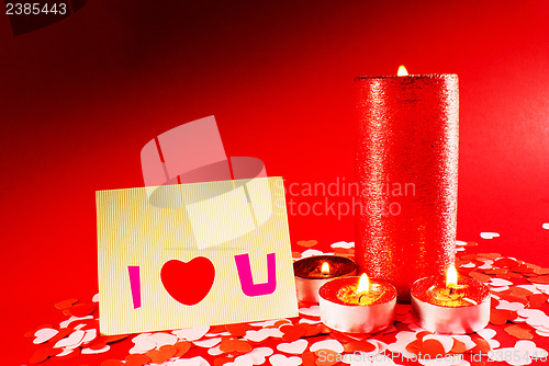 Image of St. Valentine's day greeting background with four burning candle