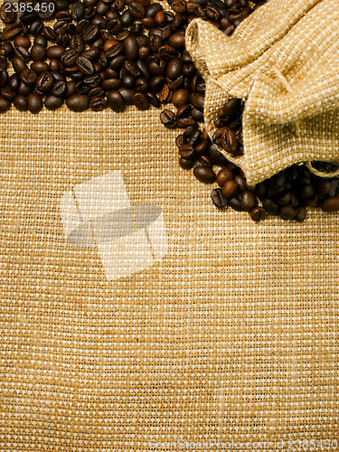 Image of Background of the roasted coffee beans and burlap