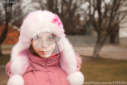 Image of Teen girl staying outdoors