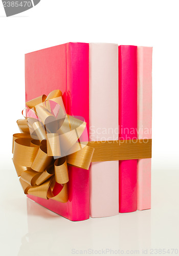 Image of Four books tied up with ribbon