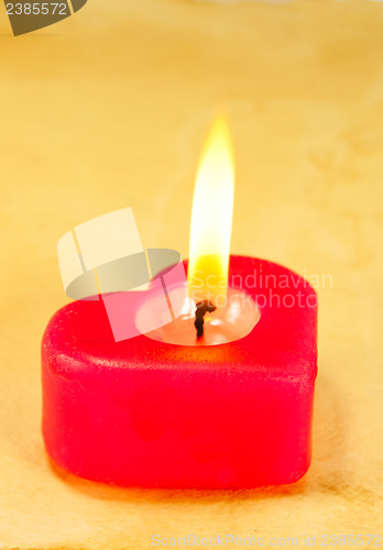 Image of Burning heart shaped candle
