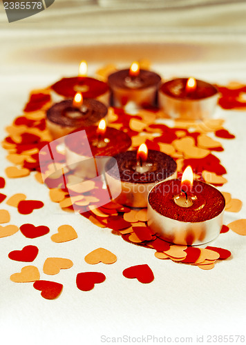 Image of Burning candles heart shaped
