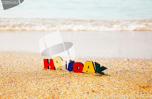 Image of Wooden colorful word 'Holiday'