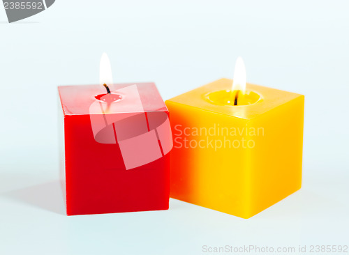Image of Two burning candles