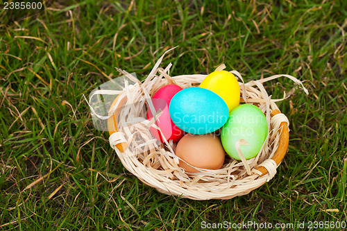 Image of Basket with the colorful Easter eggs