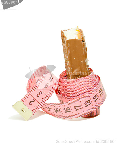 Image of Chocolate bar with a pink metering tape