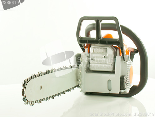 Image of Chainsaw over the white background