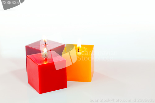 Image of Three burning candles
