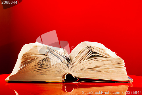 Image of Open book laying on the table