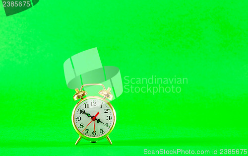 Image of Golden retro style alarm clock