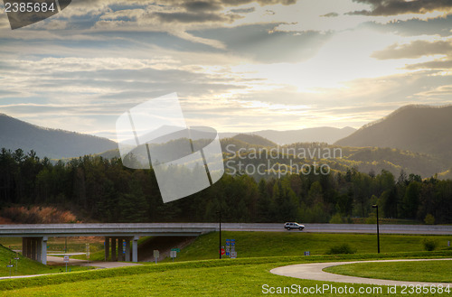 Image of Scenic view at sunset