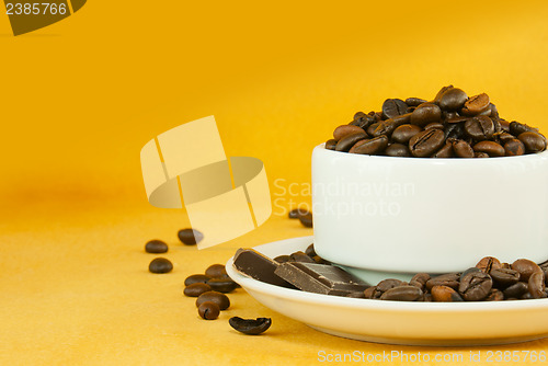 Image of Cup full with coffee beans