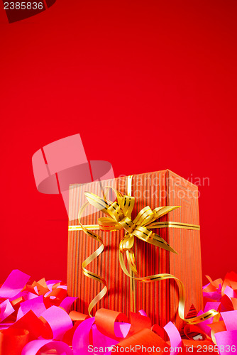 Image of Present in a red box against red background