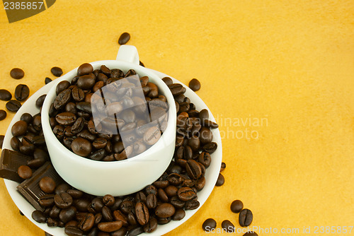 Image of Cup full with coffee beans