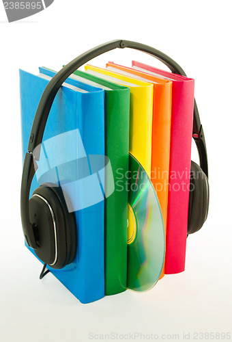 Image of Row of books and headphones - Audiobooks concept