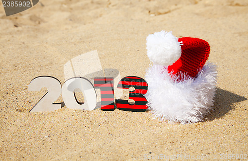 Image of Wooden 2013 year number and Santa's hat