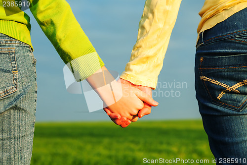 Image of Teen girls holding hands