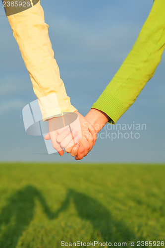 Image of Teen girls holding hands