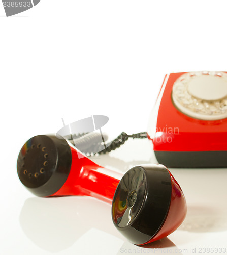 Image of Red old fashioned telephone
