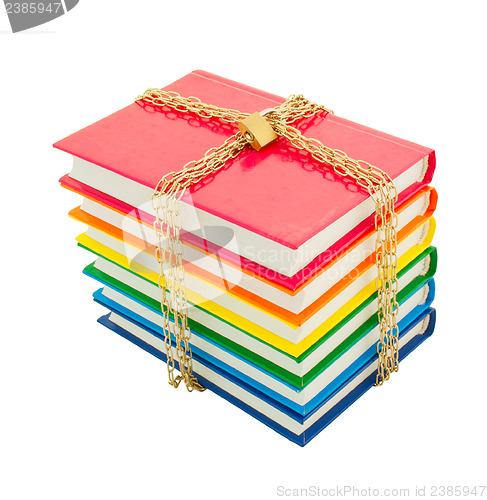 Image of Colorful books tied up with chains