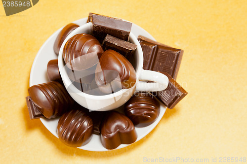 Image of Cup full with chocolate candies