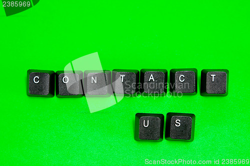 Image of Keyboard plastic keys with words Contact Us