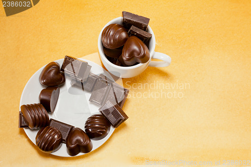 Image of Cup full with chocolate candies