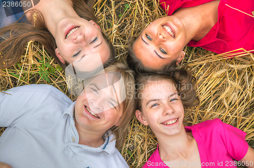 Image of Four young happy people