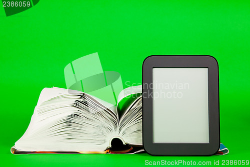 Image of Open book and e-book reader
