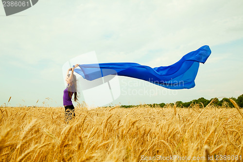 Image of Teen girl at a wheat field
