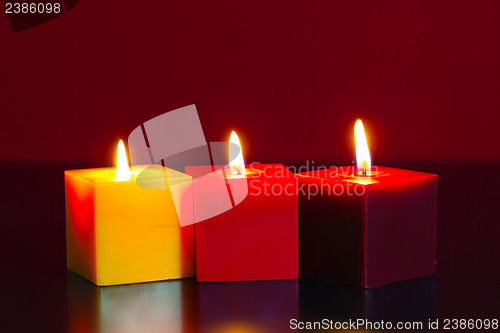 Image of Three burning candles