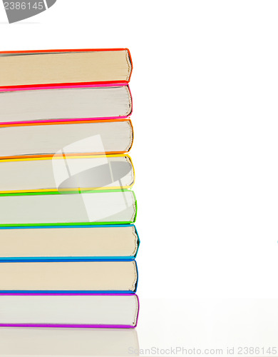 Image of Stacks of colorful books - library concept
