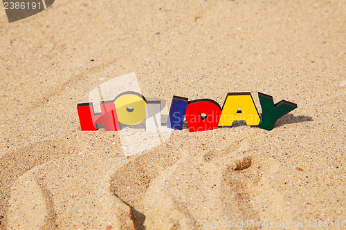 Image of Wooden colorful word 'Holiday'